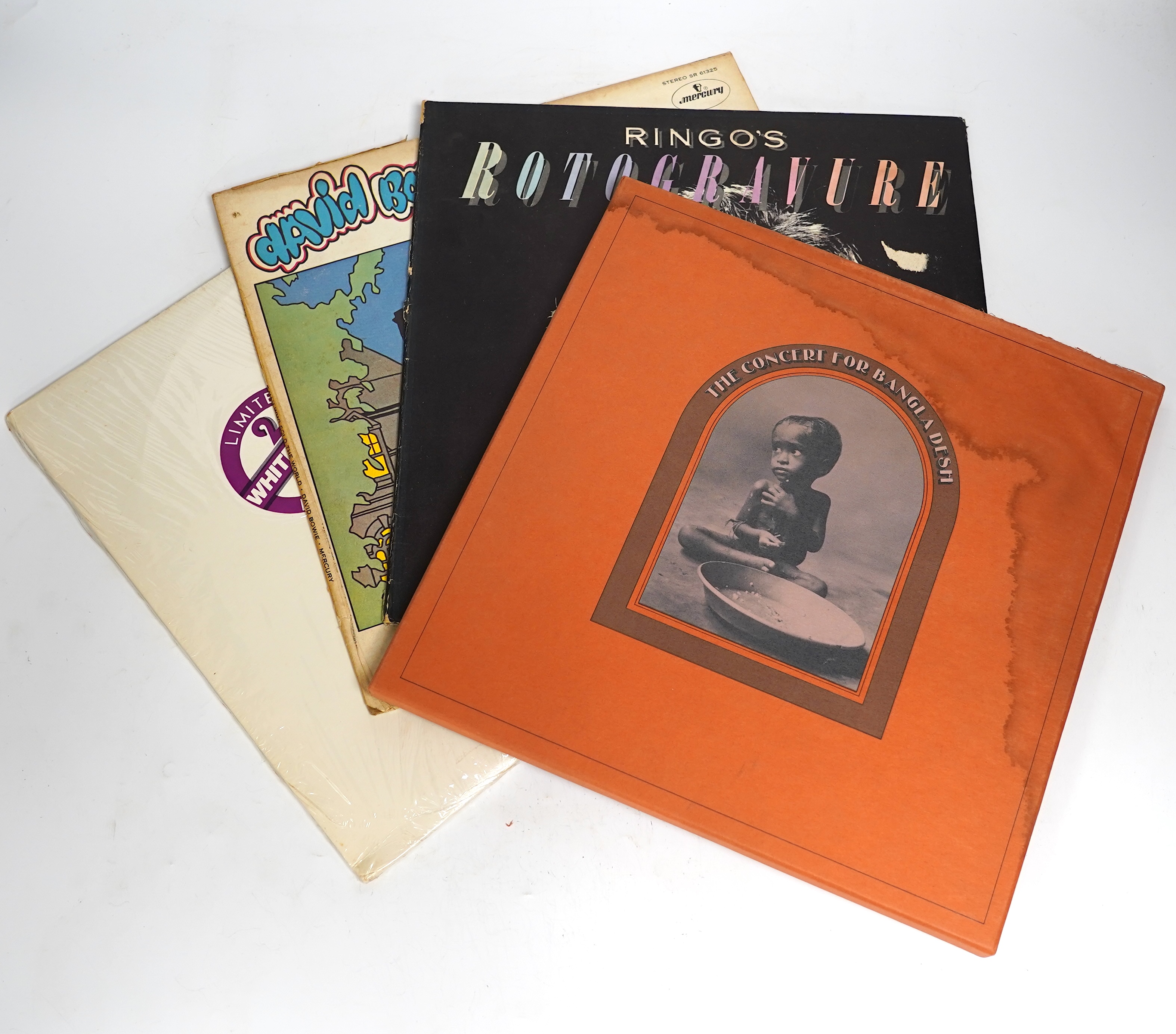 Four LP record albums; The Beatles; The White Album, U.S. issue on Capitol label SEBX-1-11841 on white vinyl, George Harrison; The Concert for Bangladesh box set, Ringo Starr; Rotogravure, on Polydor Argentinian issue, a